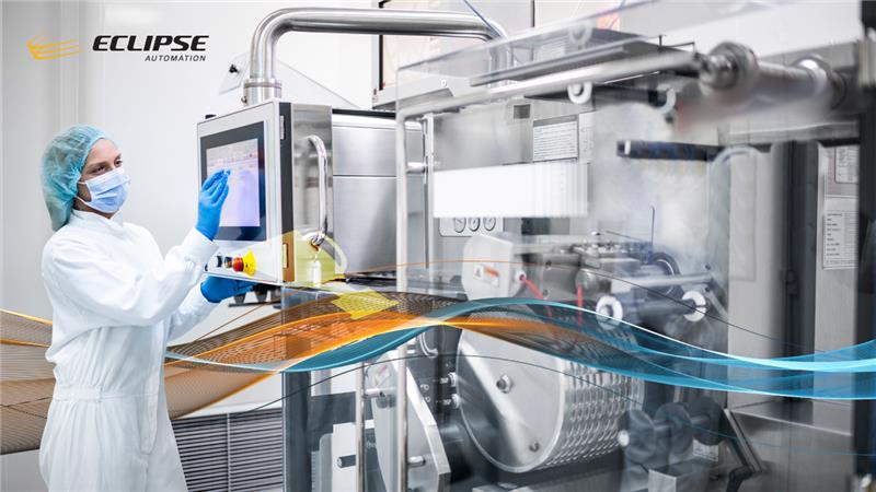 Life sciences automation showing employee using touchscreen