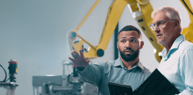 Two engineers discussing automation services and support